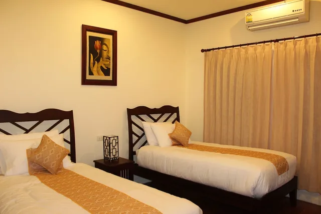 غرفة ديلوكس بسريرين منفصلين، Luang Prabang Legend Hotel 3/10
