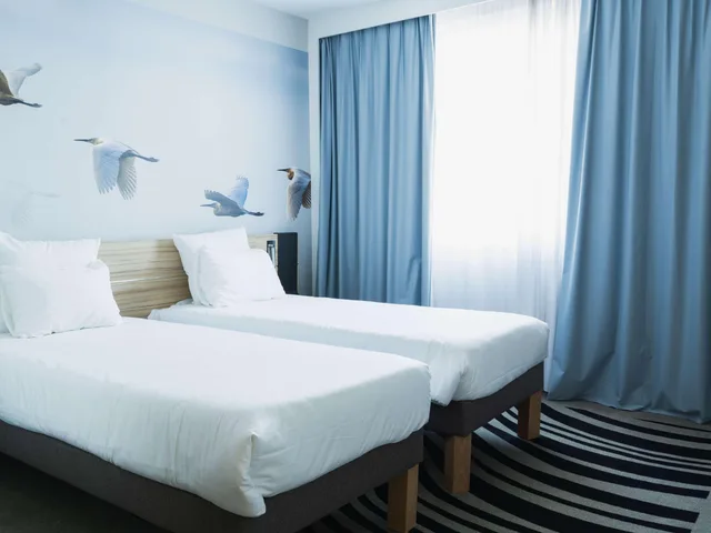 جناح عائلي بسرير مزدوج وسريرين منفصلين مع أريكة، Novotel Valence Sud 3/10