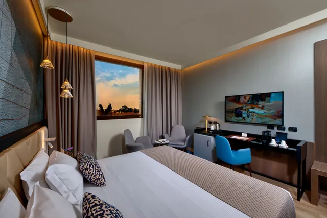 غرفة ديلوكس بسرير كينج، Savhotel Aemilia Bologna 1/3