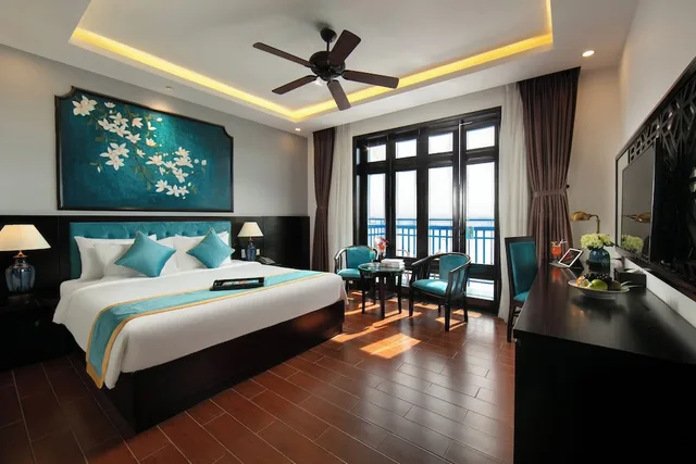 غرفة ديلوكس بسرير كينج بشرفة، Silk River Hoi An Hotel & Spa 1/4