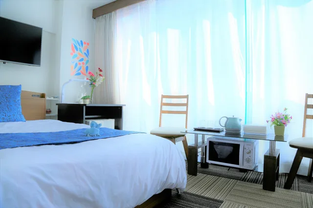 غرفة ثلاثية بسرير مزدوج وسريرين منفصلين في الطابق العلوي، Sakuragawa Riverside Hotel 7/10