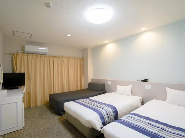غرفة قياسية بسريرين منفصلين، Hotel Caretta Amami 1/3