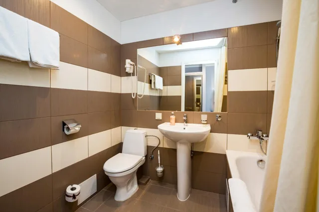 غرفة بسرير كوين، Primo Hotel 5/6