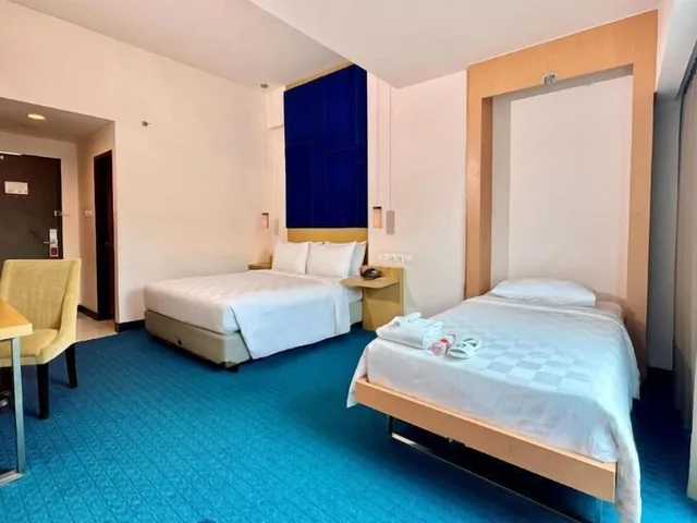 غرفة غراند بريميير ديلوكس بسرير كوين وسرير فردي وسرير كوين، Swiss-Belinn Malang 1/3