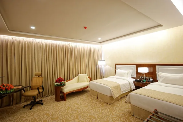 غرفة ديلوكس بسريرين منفصلين، Royal Swiss Lahore 1/2