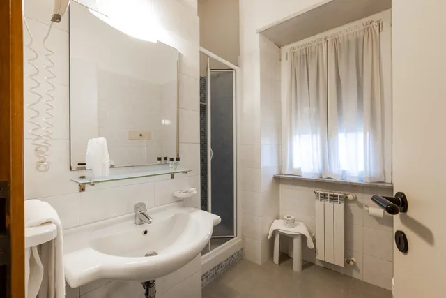غرفة كلاسيكية رباعية، Hotel Nuova Grosseto 5/8