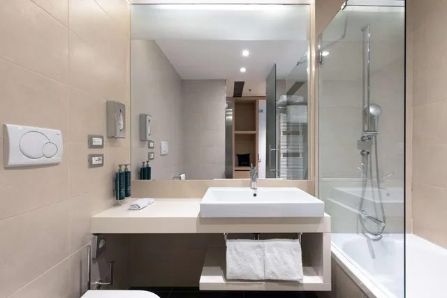جناح ركني بسرير كينج مع أريكة، Hilton Garden Inn Venice Mestre San Giuliano 2/2