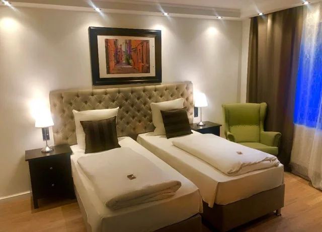 غرفة كومفورت بسريرين منفصلين بإطلالة على الحديقة بغرفة نوم واحدة، Hotel Ramor 1/1