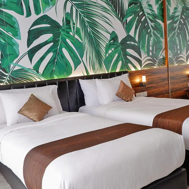 غرفة بسريرين منفصلين بشرفة، Front One Resort Magelang 3/10