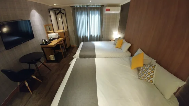 غرفة قياسية رباعية بسريرين مزدوجين، HOTEL TONG YEONDONG JEJU 5/7