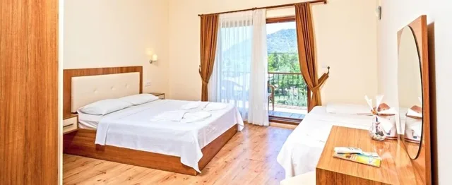 غرفة ثلاثية بسرير مزدوج وسرير فردي، Adrasan Deniz Hotel 1/2