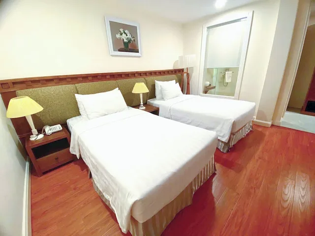 غرفة سوبيريور رباعية بسرير كوين وسريرين منفصلين، Phoenix Hotel Vung Tau 9/10