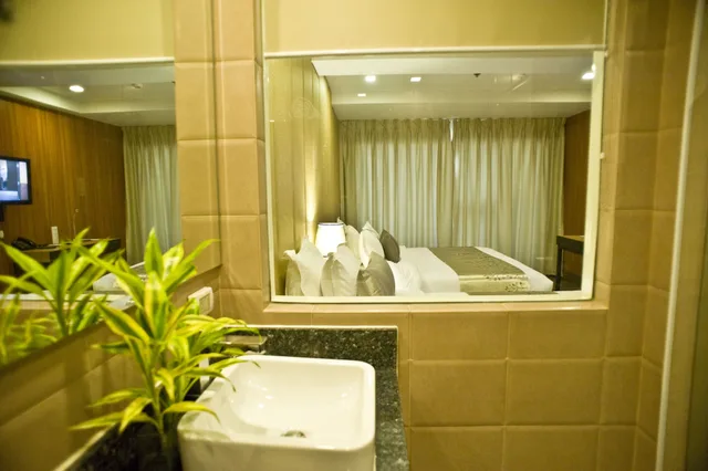 غرفة ديلوكس بسرير كينج وسرير فردي، Goldberry Suites and Hotel Mactan 10/10