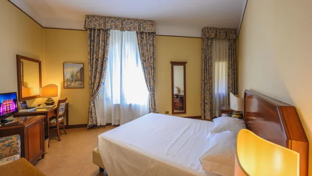 غرفة مفردة بسرير مزدوج، Albergo Reggio 1/10