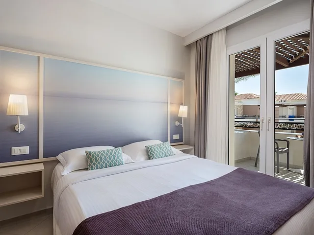 2 Bedrooms, Apartment, 2 Queen and Twin Beds, Inland View، Atlantica Caldera Beach Hotel 2/5