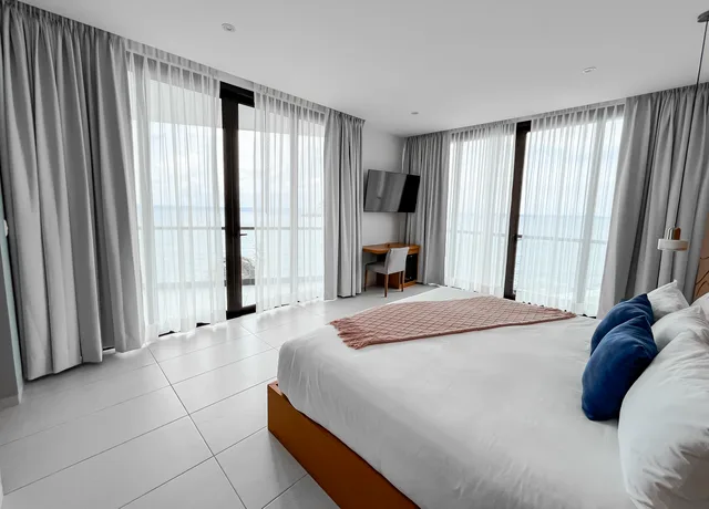 غرفة ديلوكس بسرير كينج بإطلالة على البحر، Hotel Puerto Libre 1/1