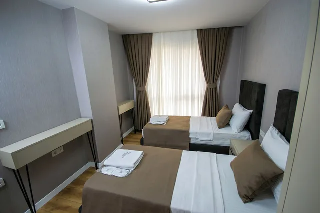 جناح عائلي ديلوكس بسريرين منفصلين مع أريكة، Luxury Life Suites 5/9