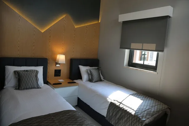 دوبلكس عائلي بسريرين منفصلين وسريرين كينج بـ3 غرف نوم، SAPANCA ALFA SUITES & SPA 1/5