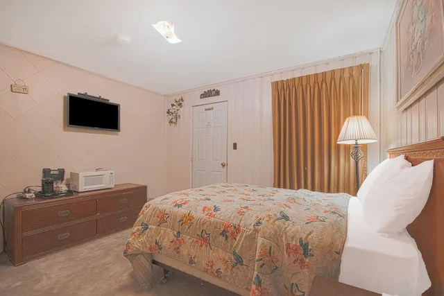 غرفة بسرير كوين، Sunflower Motel Hiawatha By OYO 1/8