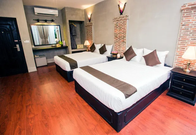 غرفة ديلوكس عائلية بسريرين كوين بشرفة، Vacation Boutique Hotel 1/2