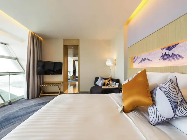 جناح ديلوكس بسرير كينج وسرير كوين، Novotel Suzhou Sip 3/4