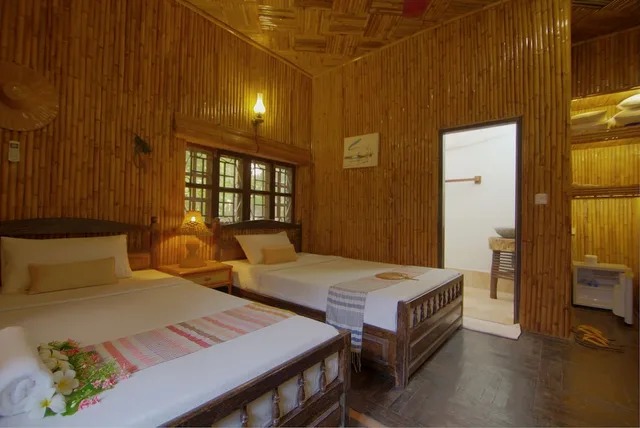 Private, Palm, Bungalow, Triple, 1 Double and 1 Single Bed، Palm Village Resort Spa 1/2