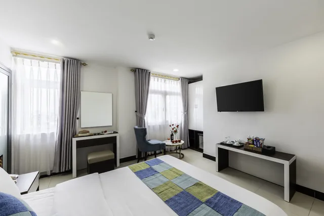 غرفة ديلوكس بسرير كينج، Phuc Thanh Hotel 4/6
