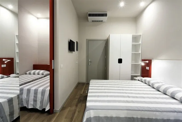غرفة عائلية بسرير مزدوج وسرير فردي بغرفتي نوم، Hotel Aurea 1/3