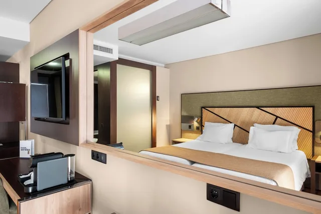 غرفة بسرير فردي مع سرير إضافي، Axis Porto Business & Spa Hotel 1/10