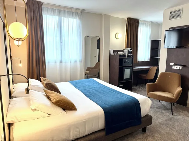 غرفة تنفيذية بسرير كينج، Best Western Hotel Le Quercy 2/2