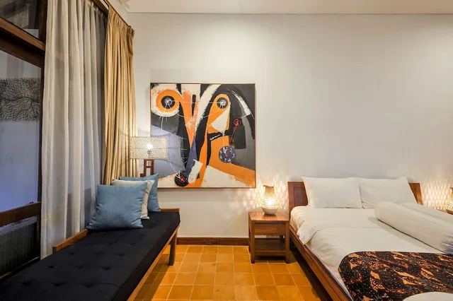 غرفة ديلوكس بسرير كينج، Rumah Mertua Heritage Yogyakarta 6/7