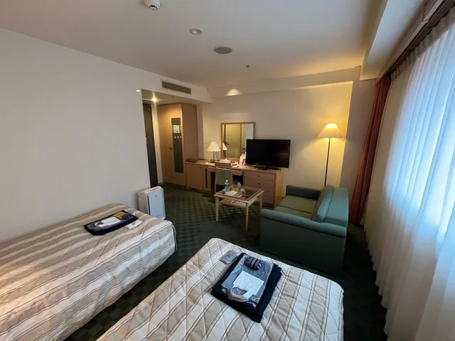 غرفة بسريرين منفصلين في الملحق، Jasmac Plaza Hotel 4/5