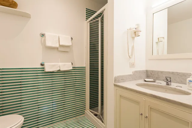 جناح بسرير كوين مع أريكة، Corso Italia Suites 5/9