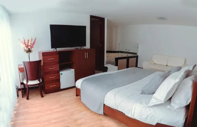 جناح بسرير كينج بجاكوزي، Nogal Suite Hotel Pasto 8/9