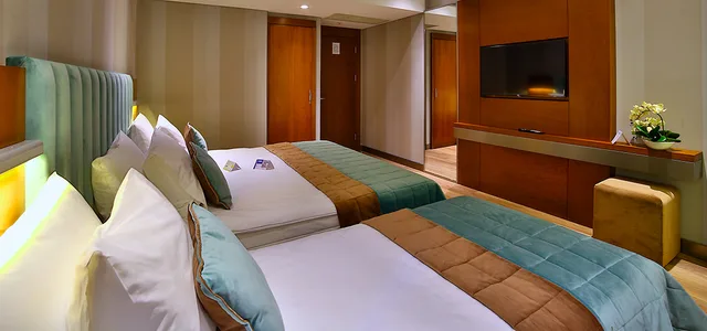 غرفة قياسية ثلاثية، The Tango Hotel 3/4
