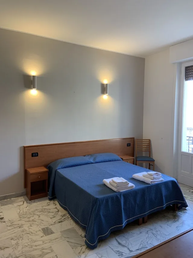 Superior, 2 Double Beds, 2 Bunk Beds, Mountain Side, Courtyard View، Lungomare Hotel 1/3