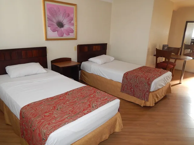 غرفة تنفيذية رباعية بسرير مزدوج وسريرين منفصلين، Hotel Dan Inn Curitiba By Nacional Inn 3/10