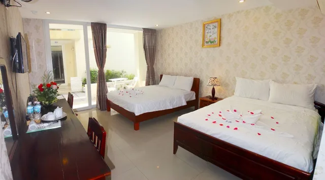 غرفة عائلية بسريرين مزدوجين بإطلالة على الحديقة، Hai Yen Resort 4/10