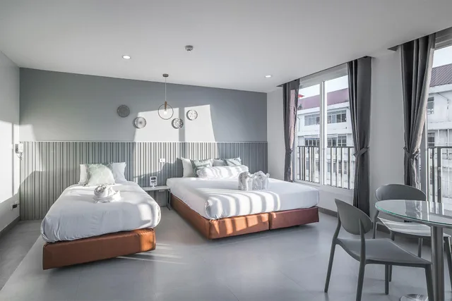 غرفة كلاسيكية ثلاثية بسرير كينج وسرير فردي، Tree Tara Hotel Lampang 1/1