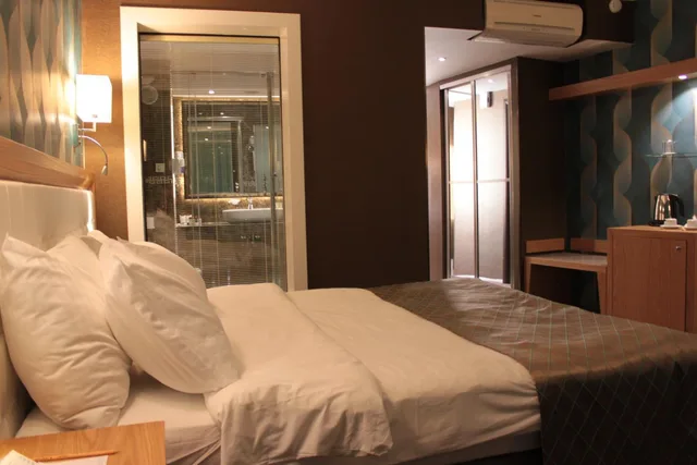 غرفة ديلوكس بسرير مزدوج أو سريرين منفصلين بإطلالة على المدينة، Akol Hotel 7/10