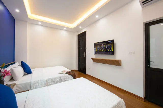 غرفة سوبيريور ثلاثية بسرير مزدوج وسرير فردي، Hanoi Golden Hotel 1/3