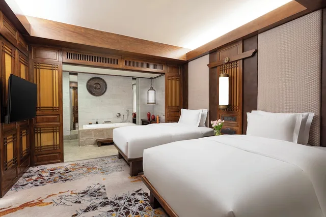 جناح جونيور بسريرين منفصلين مع دخول صالة النادي، INTERCONTINENTAL LIJIANG ANCIENT TOWN RESORT 4/5