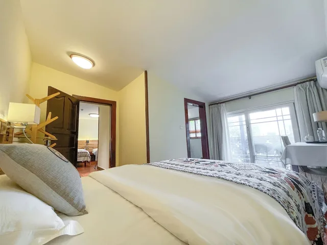 غرفة ثلاثية بثلاثة أسرّة، Snow Lion Riverside Resort 1/5