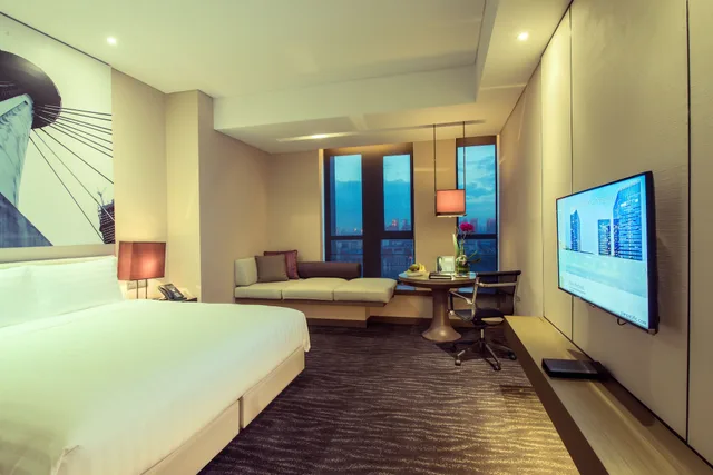 غرفة ديلوكس بسرير كينج بإطلالة على المدينة، Pan Pacific Tianjin 1/5