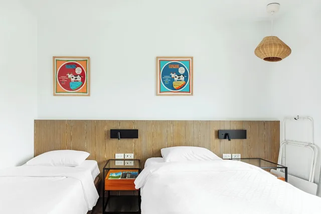 غرفة بسريرين منفصلين بشرفة، Kenting Fairyland & Farm Guest House 4/10