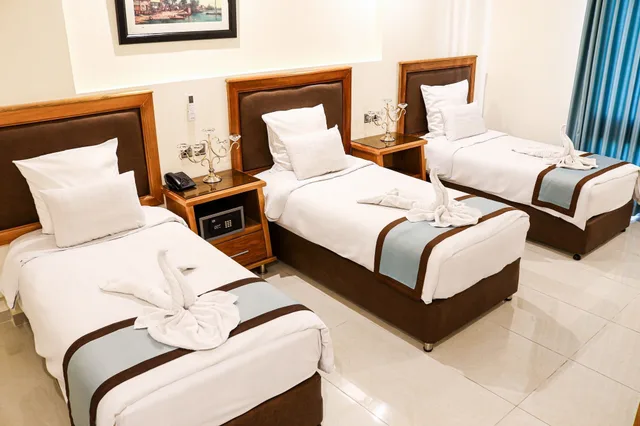 غرفة ثلاثية بثلاثة أسرّة، Raed Hotel Suites 4/10