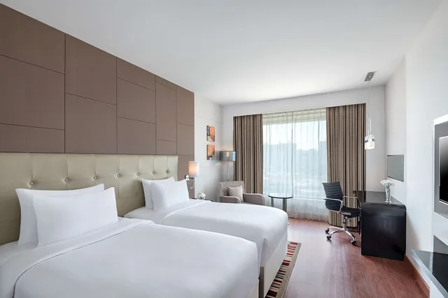 غرفة بزنس بسريرين منفصلين، Radisson Blu Pune Hinjawadi 1/10