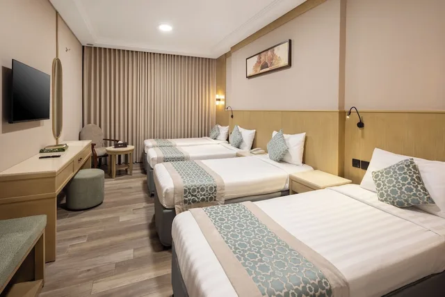 غرفة رباعية بأربعة أسرّة، فندق عفراء(Afraa Hotel) 3/8