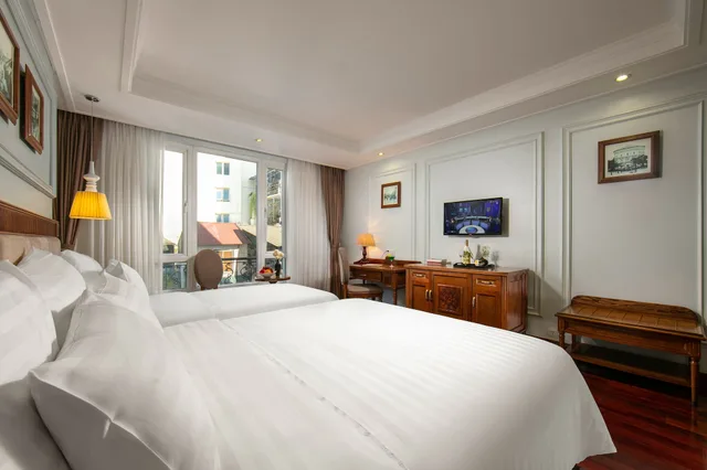 غرفة ديلوكس ثلاثية بسرير كوين وسرير فردي بإطلالة على المدينة، Hanoi Pearl Hotel 1/10