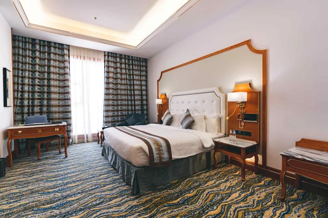 جناح تنفيذي بسرير كوين وسريرين منفصلين، فندق إريديوم(Iridium Taif Hotel) 1/2